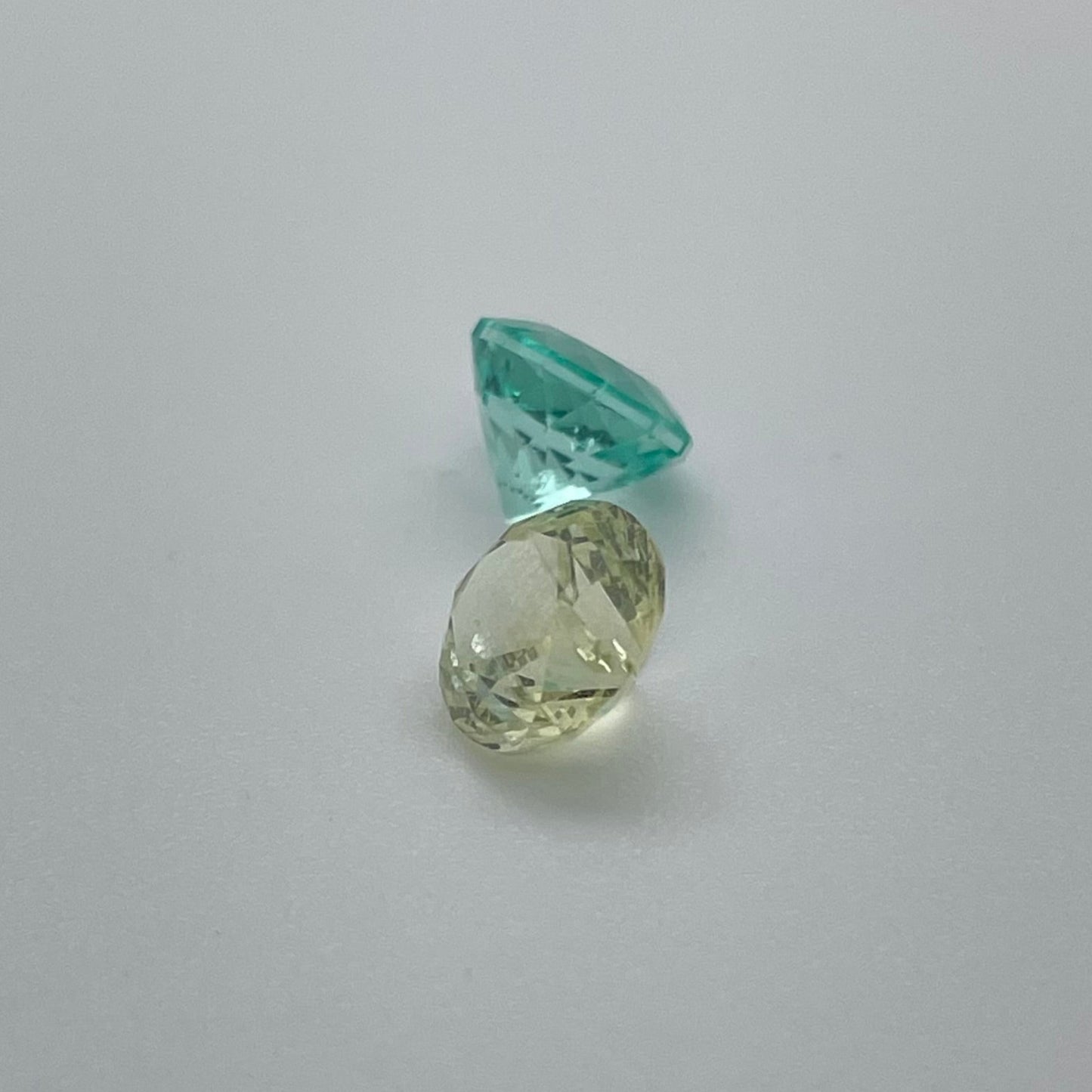 Brilliant cut yellow Sapphire and Colombian Emerald duo
